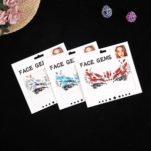 Face gems set for Halloween and festival makeup in red blue and iridescent colors