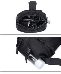 Detail view of black functional tactical bag showing multi-pocket storage and large capacity