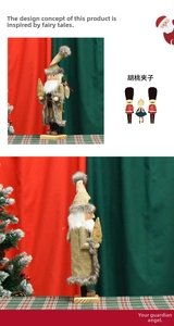 Détail d'un casse-noisette en bois avec habit en toile, fourrure et petit sapin doré