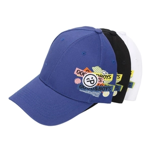 Close-up of smiley face embroidery and Good & Boys text on cotton baseball caps