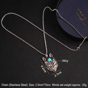Wolf head pendant necklace with blue gemstone and stainless steel chain on black leather