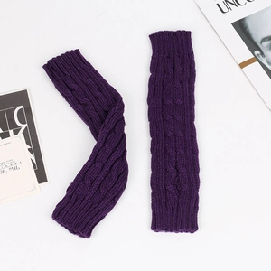 Detailed view of purple cable-knit fingerless arm warmers in soft acrylic yarn fabric