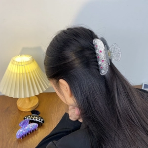 Star and moon acetate hair claw set including silver glitter and marble patterns
