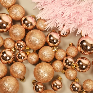 Rose gold and champagne Christmas ball set with shiny and matte finishes for tree decoration