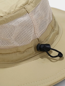 Breathable khaki sun hat with mesh detail and adjustable drawstring for summer wear