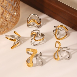 Two-tone gold and silver irregular wave stainless steel open ring with glossy metal finish