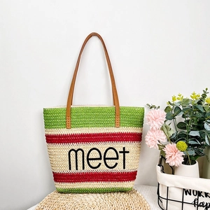 Woven straw tote bag with green stripes, leather handles and embroidery for summer beach