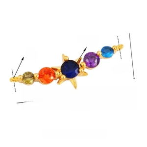 Macro detail of gold-plated jewelry connector showing 25mm length and gem dimensions