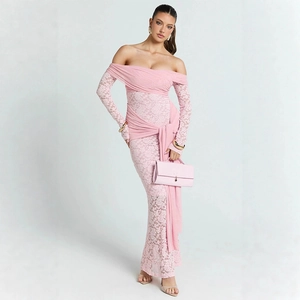 Detailed close-up of pink lace off-shoulder dress with ribbon waist and elegant texture