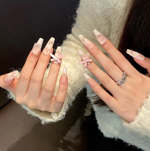 Pink matte long coffin press-on nails with 3D ribbon bows and butterfly pattern