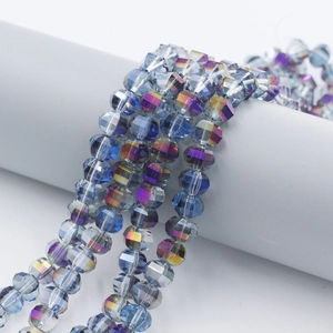 Macro shot of 8mm multi-faceted iridescent blue watermelon beads for DIY jewelry