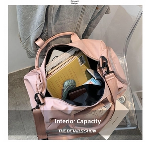 Spacious pink fitness bag interior showing large storage capacity for various travel items
