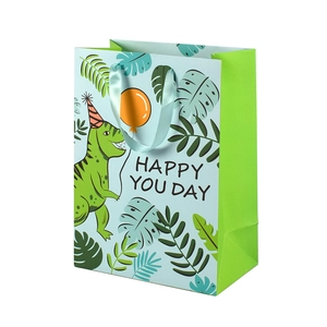 Light blue dinosaur gift bag with Happy You Day text and green ribbon handle