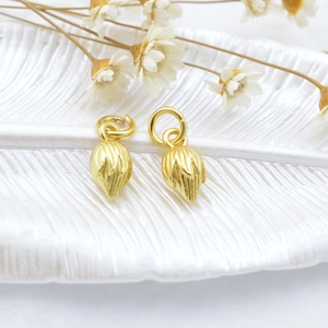 Detailed golden flower bud pendant charms with textured surface for DIY jewelry making