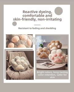 Detailed close-up of soft cat paw plush pillow featuring skin-friendly fabric texture