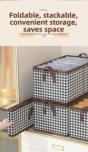 Detail view of foldable houndstooth fabric storage box with reinforced brown handles