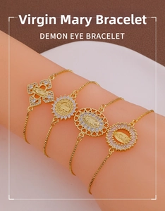 Set of four gold-plated Virgin Mary bracelets featuring white zircon pendants and beads