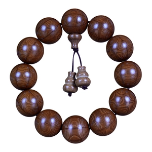 Polished Wutaishan wood prayer beads with traditional gourd pendants and unique grain