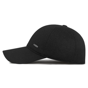 Winter thermal baseball cap for men featuring warm ear flaps and textured black fabric