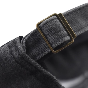 Detail of adjustable metal buckle and washed cotton texture on a grey baseball cap