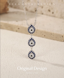 Close-up of S925 silver Evil Eye teardrop pendants with micro-pave setting on O-chain