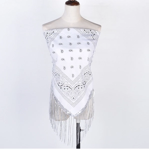 Detailed view of a white paisley bandana with silver fringe styled as a crop top on a mannequin