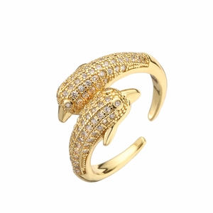 Gold plated open ring featuring dual dolphin design with shimmering zircon pave setting