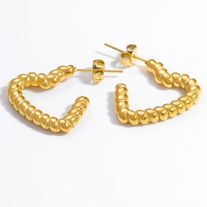Close-up of twisted heart-shaped 18k gold-plated stainless steel stud earrings with backs