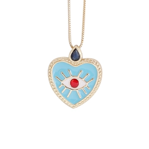 18K gold heart necklace with blue enamel evil eye pendant and teardrop gem