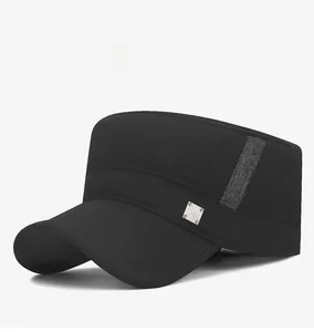 Detail view of black military flat top hat featuring a metal tag and textured strap