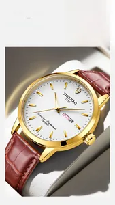 Macro view of men's gold watch with white dial, double calendar, and genuine diamond