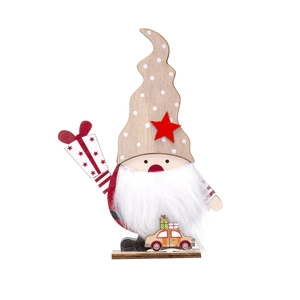 Detalle de gnomo de Navidad de madera con barba blanca y estrella roja en base blanca