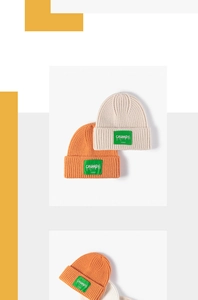 Detail of ribbed knit beanie with green CHUANGYi logo patch and soft texture weave