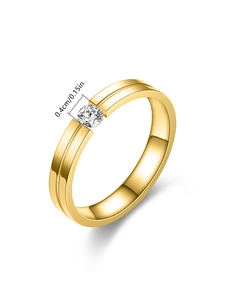 Detail shot of 4mm wide gold titanium steel ring with embedded zircon and dimension label