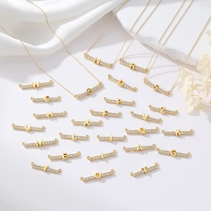 Golden 14k gold plated necklace with zirconia encrusted double-circle alphabet pendants