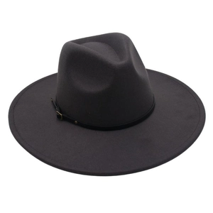 Close-up detail of dark grey wool fedora jazz hat with a black belt buckle band accessory