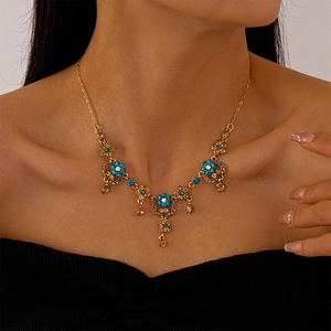 Vintage floral heart necklace with blue rhinestones and gold chain for women