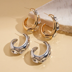 Minimalist geometric C-shaped hoop earrings with rhinestones in gold and silver finish
