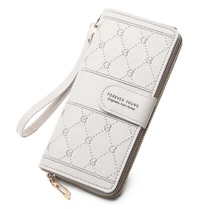 Detailed view of white PU leather long wallet with heart quilted pattern and wrist strap