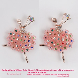 Detail of rose gold ballet dancer brooches with pink petals and colorful rhinestones
