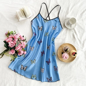 Ice silk slip nightdress with butterfly print and cross straps in light blue color
