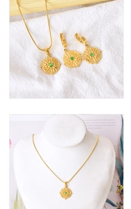 Detailed macro view of 18k gold plated necklace with green agate sun pattern pendant