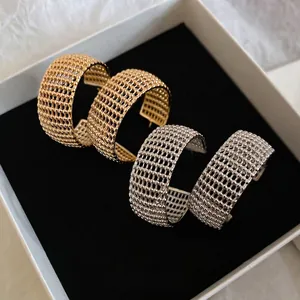 Chic wide C-shaped mesh grid hoop earrings in gold and silver finish for women