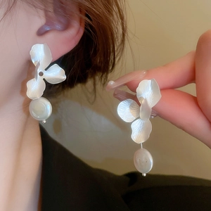 Elegant silver brushed metal flower earrings with white freshwater pearl drop pendants