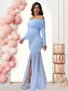 Detail of off-shoulder maternity dress with mesh fishtail hem for baby shower parties