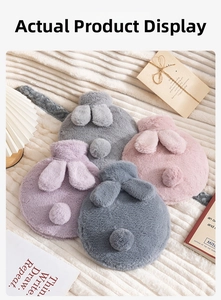 Detail view of plush rabbit ear hot water bottle covers in four soft pastel colors