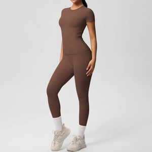 Side view of dark brown seamless high-waist yoga leggings and slim fit t-shirt set