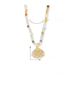Detail of beaded necklace with rhinestone-encrusted shell pendant and dimensions