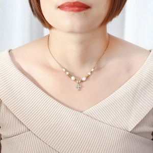 Gold-plated stainless steel necklace with crystal cross pendant and pearl bracelet set