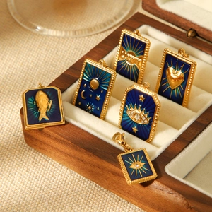 Set of 6 gold stainless steel enamel charms with celestial sun moon and eye motifs